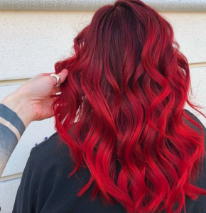 Illuminated red 2019 hair color trends Tribeca Salons