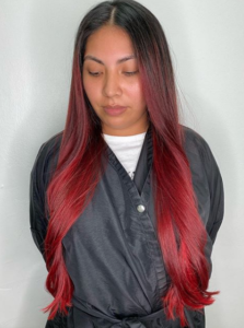 red long straight womans hair tribeca color salon tampa