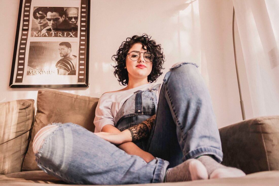 woman with curly hair between salon visits